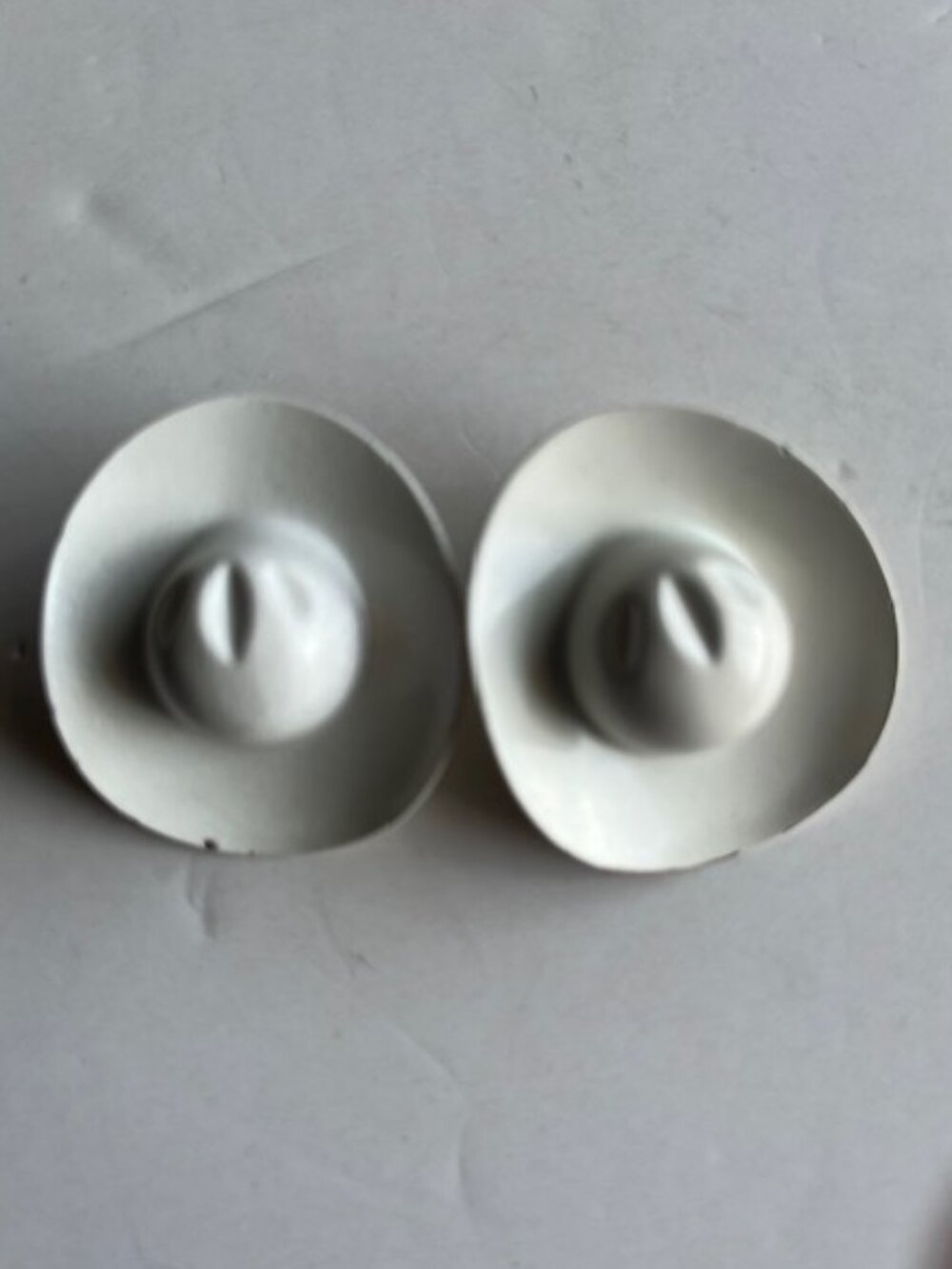 Cowboy hat western style earrings.